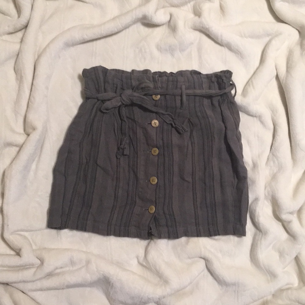 grey/green button down, tied skirt